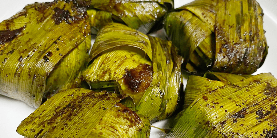 Pan fried pandan chicken on a plate