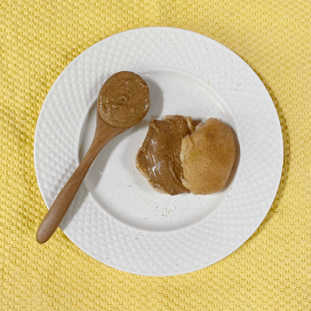 Cacao Crunch Peanut Better unsweetened peanut butter on a pandesal