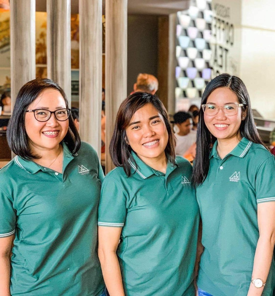 Three ladies smiling