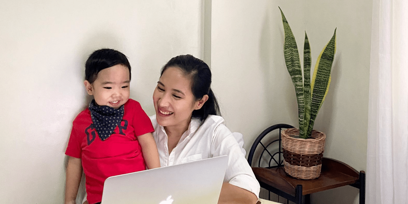 Mom and son attending a virtual class