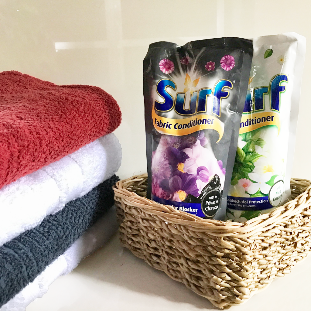 Laundry set of fabric conditioners in a rattan basket