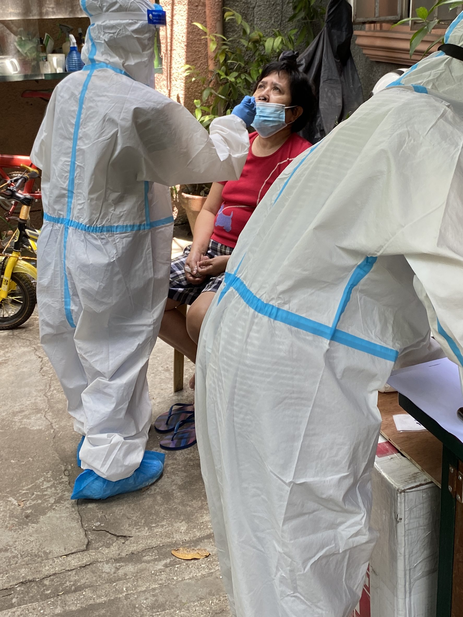 CESU staff administering RT-PCR test