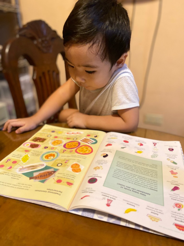 Tikoy likes browsing this book on his own :)