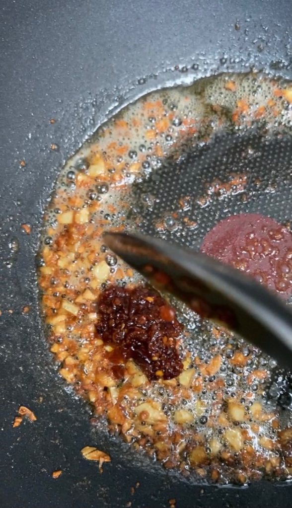 Adding a tablespoon of chili garlic to the dish