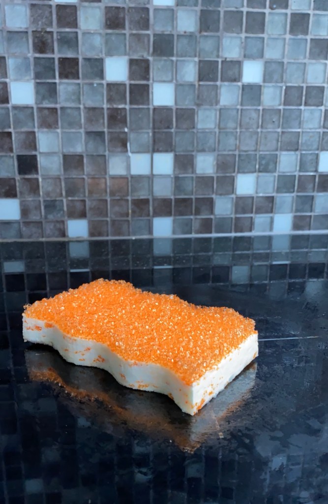 Trying Eraser Daddy Melamine Eraser on stovetop