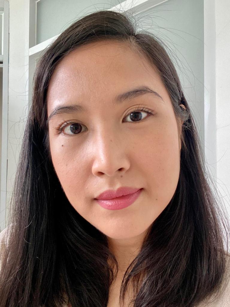 A selfie of a woman as a before picture prior to trying Luxx Lash magnetic lashes in Diana