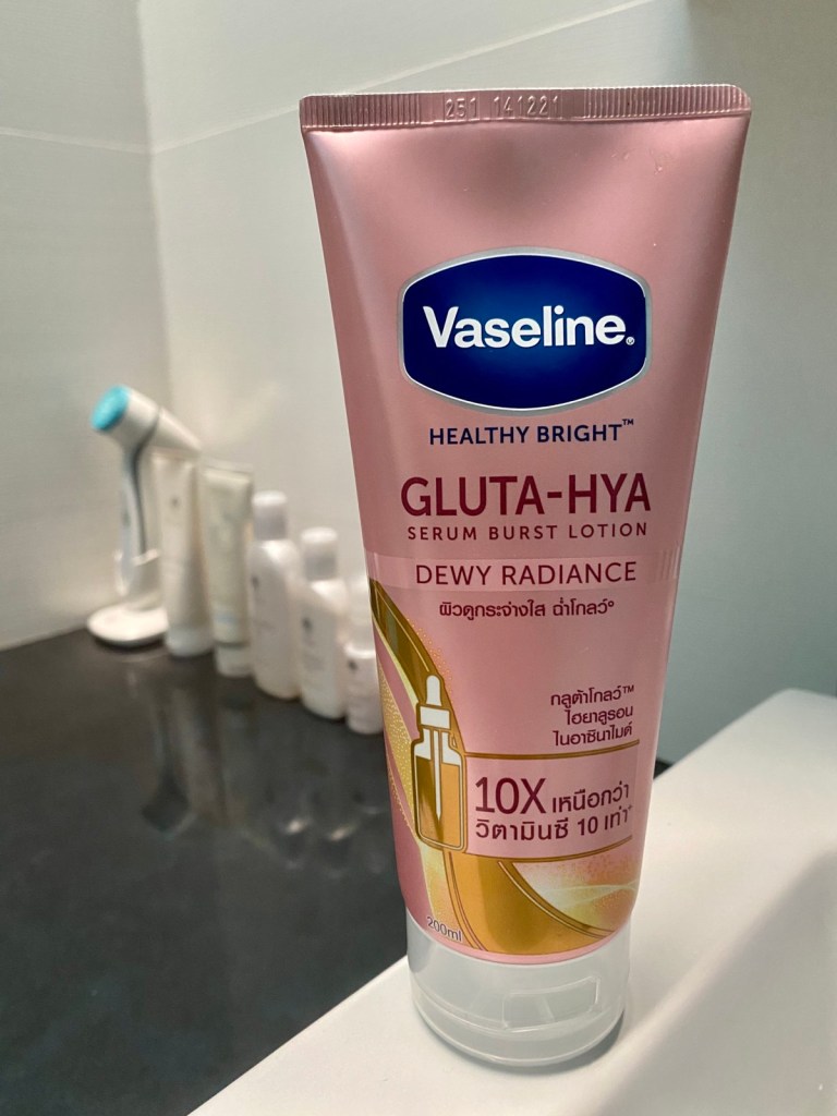 A tube of Vaseline Gluta-Hya Lotion on the sink