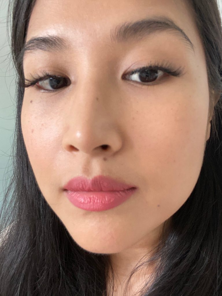 A close up photo of a woman wearing Diana magnetic lashes by Luxx Lash