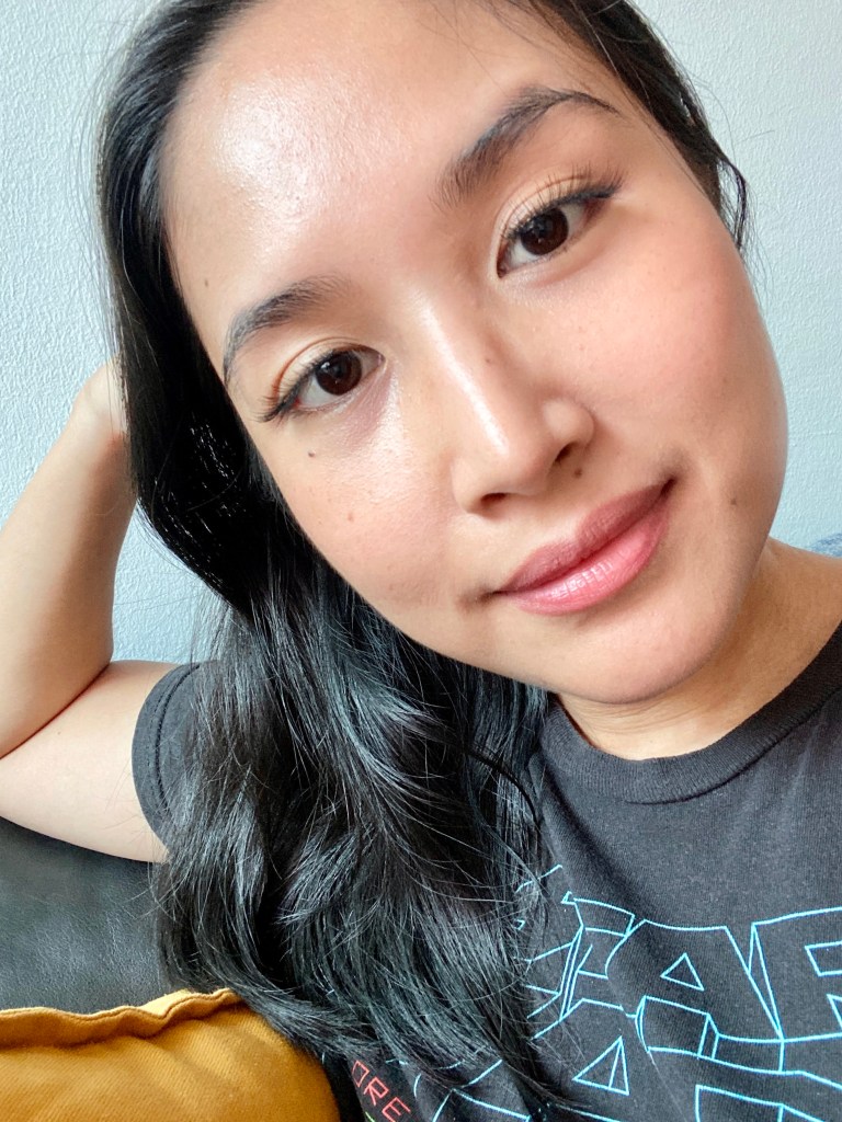 Woman wearing a pair of Luxx Lash Magnetic Lashes in Lily