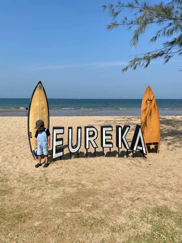 Eureka Beach Cafe Logo with surf boards