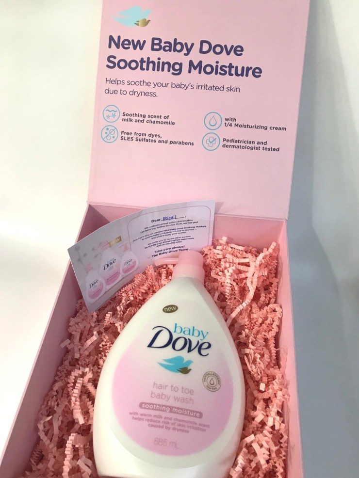 A pink gift box with baby dove soothing moisture
