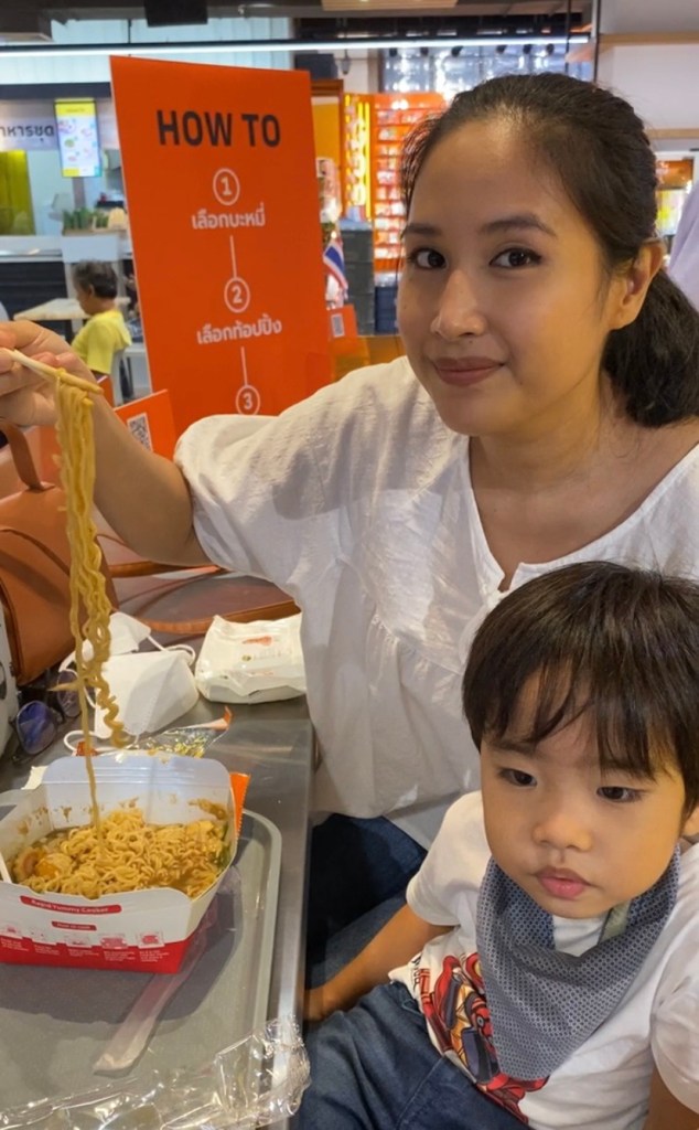 Eating instant ramen at good noodle Bangkok