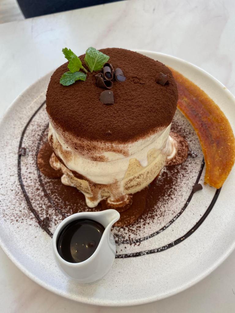 Tiramisu souffle pancakes with caramelized banana