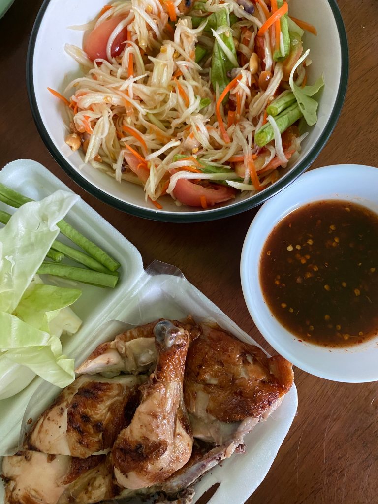 Thai grilled chicken, veggies, and som tum