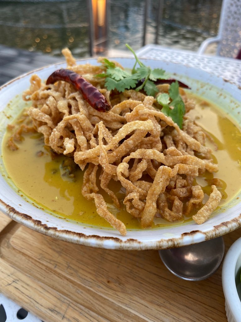 Khao Soi topped with crispy noodles