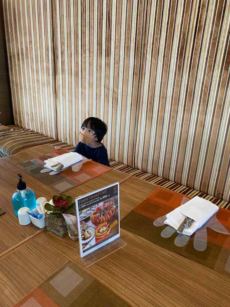 LIttle boy in a buffet