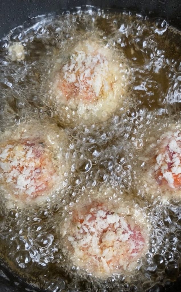 deep frying breaded meatballs