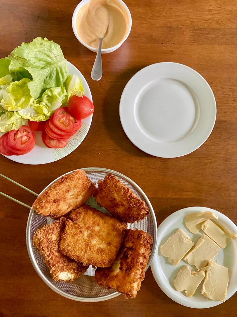 Crispy tofu burger assembly line