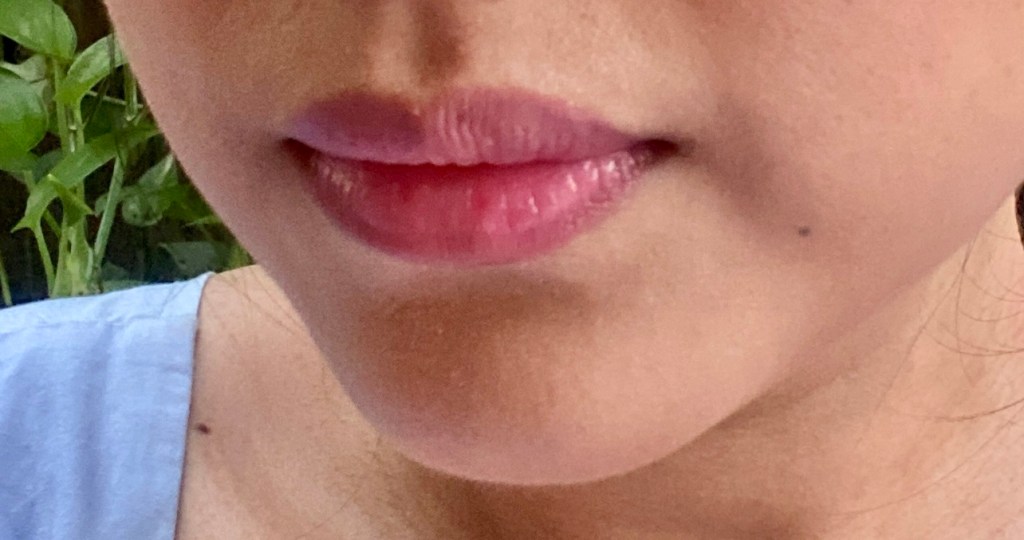Close up look on lips with lip balm