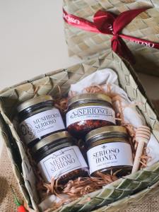 A gift set with bottles of chili garlic sauce