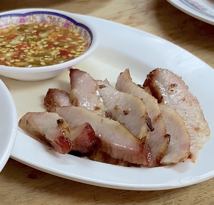 a plate of grilled pork shoulder