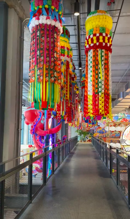 Mall bridge with paper decor